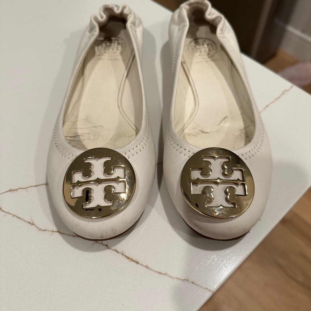 Tory Burch Ivory Flats with Metallic Emblem